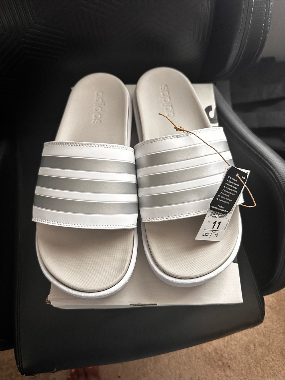 Adidas womens Adilette Slides in White/Silver Casual Pool & Beach sandal